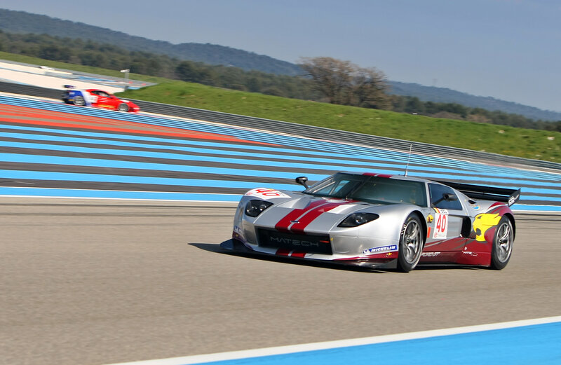 Race cars on a track