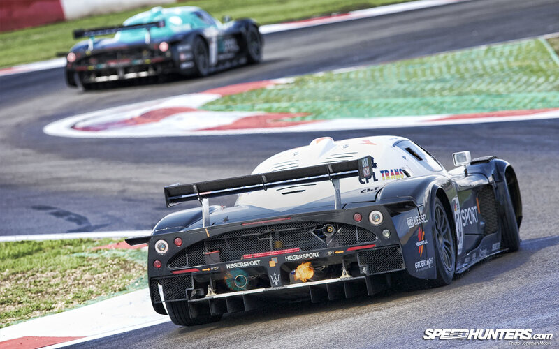 Race cars on a track