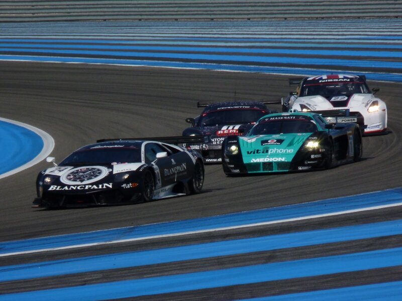 Race cars on a track