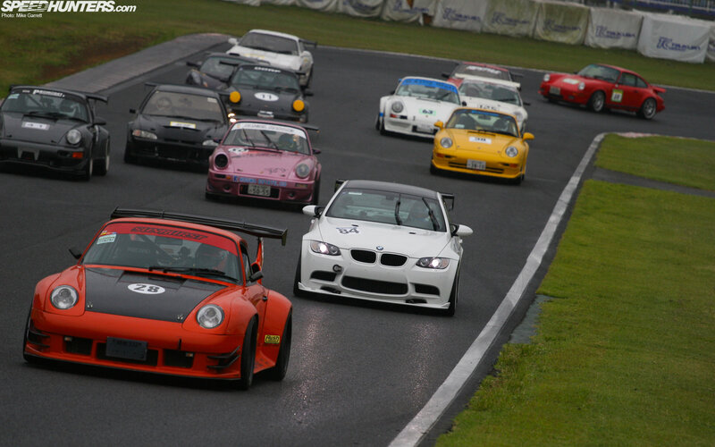 Race cars on a track