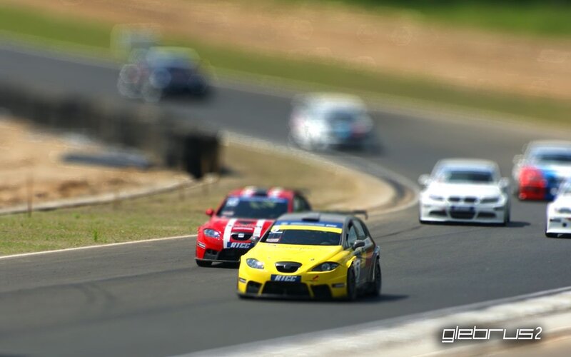 Race cars on a track