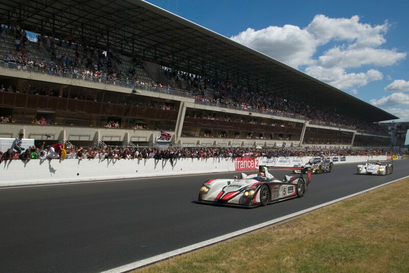 Race cars on a track