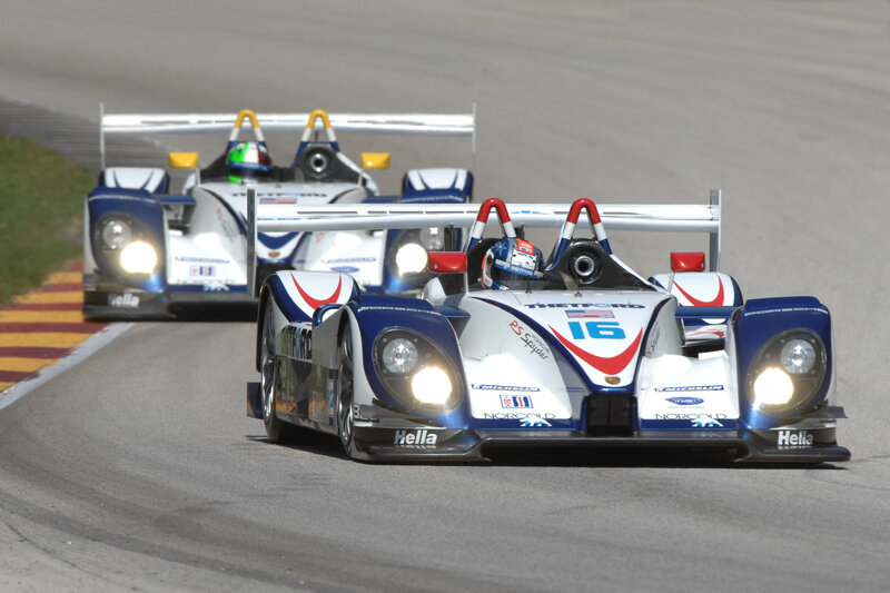 Race cars on a track