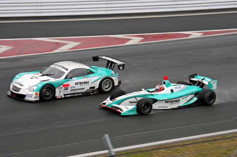 Race cars on a track