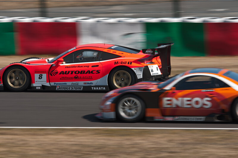Race cars on a track