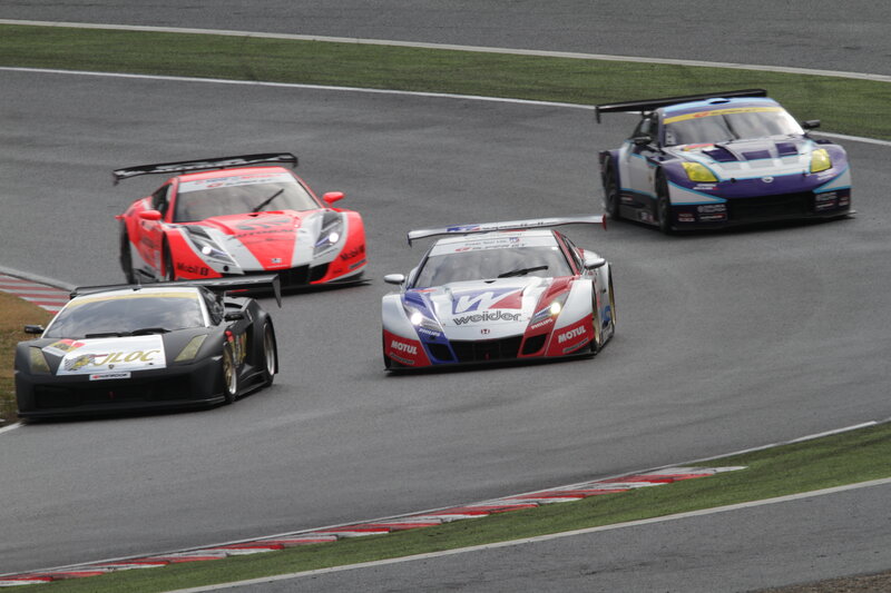Race cars on a track