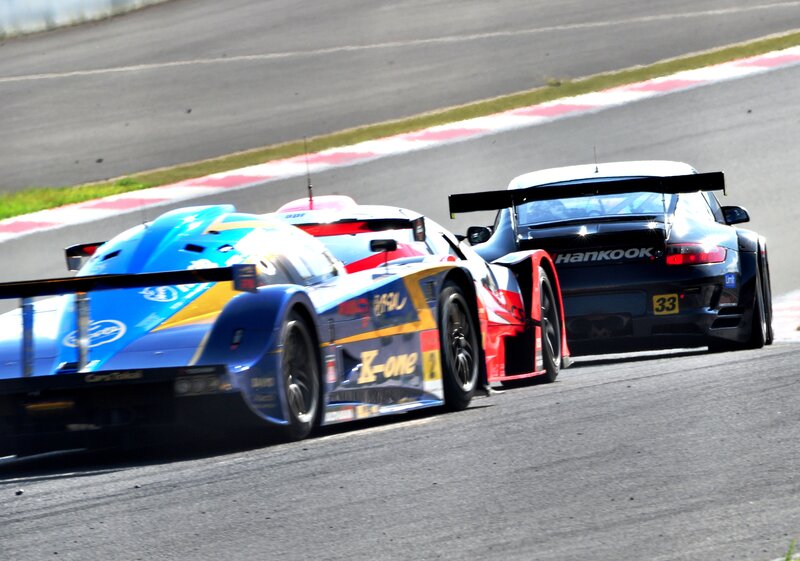 Race cars on a track