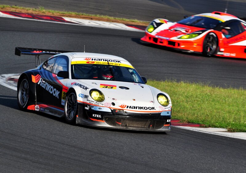 Race cars on a track