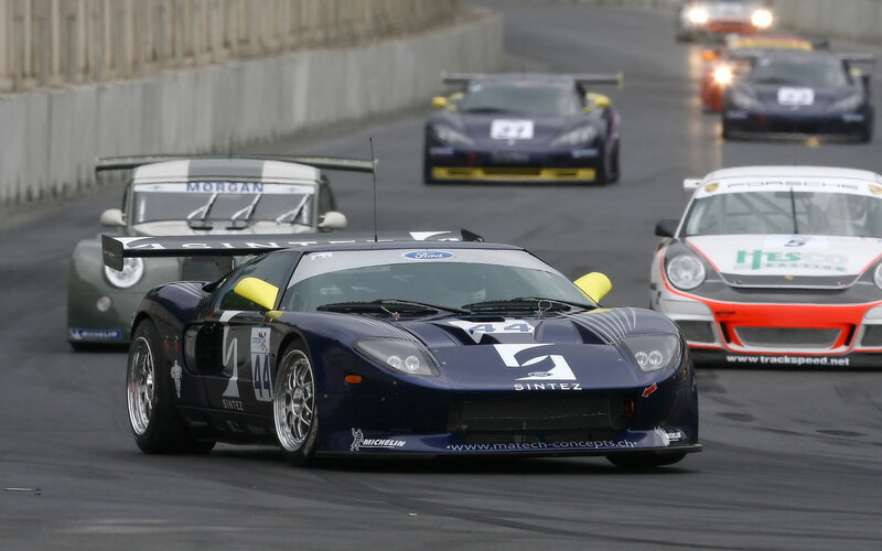 Race cars on a track
