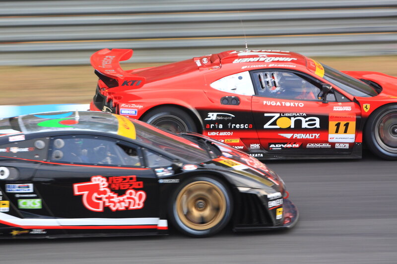 Race cars on a track