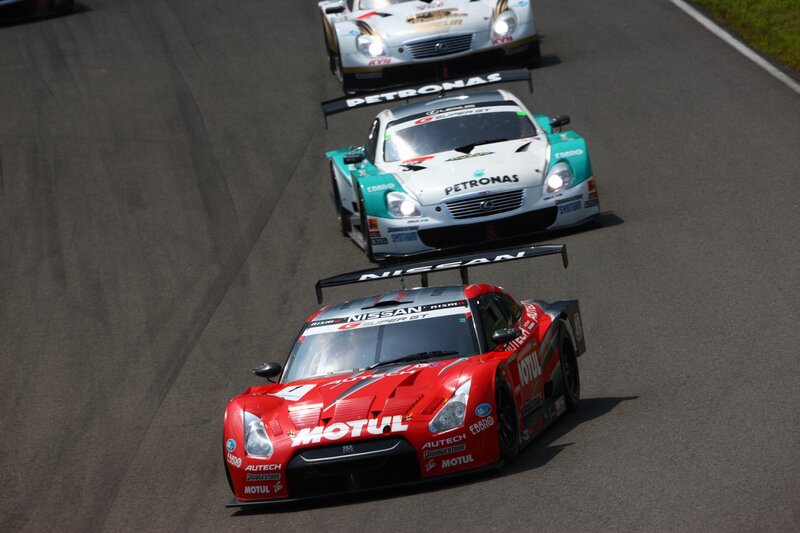 Race cars on a track