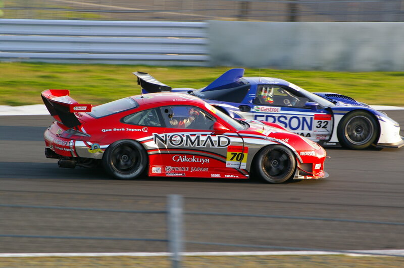 Race cars on a track