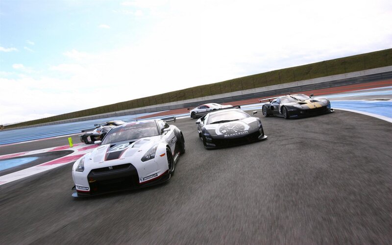 Race cars on a track