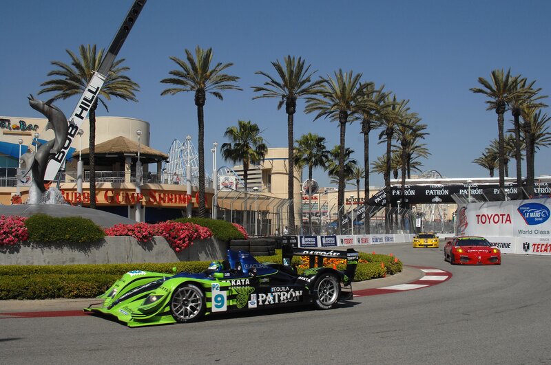 Race cars on a track near the beach
