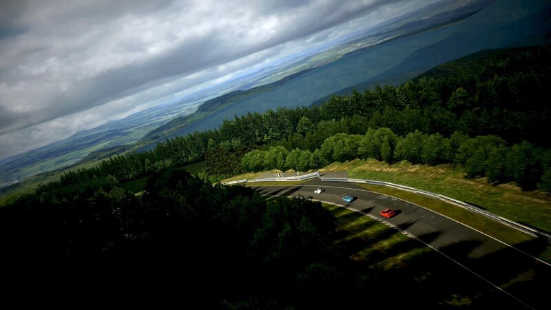Race cars on a winding track