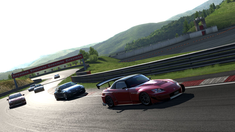 race cars on a winding track