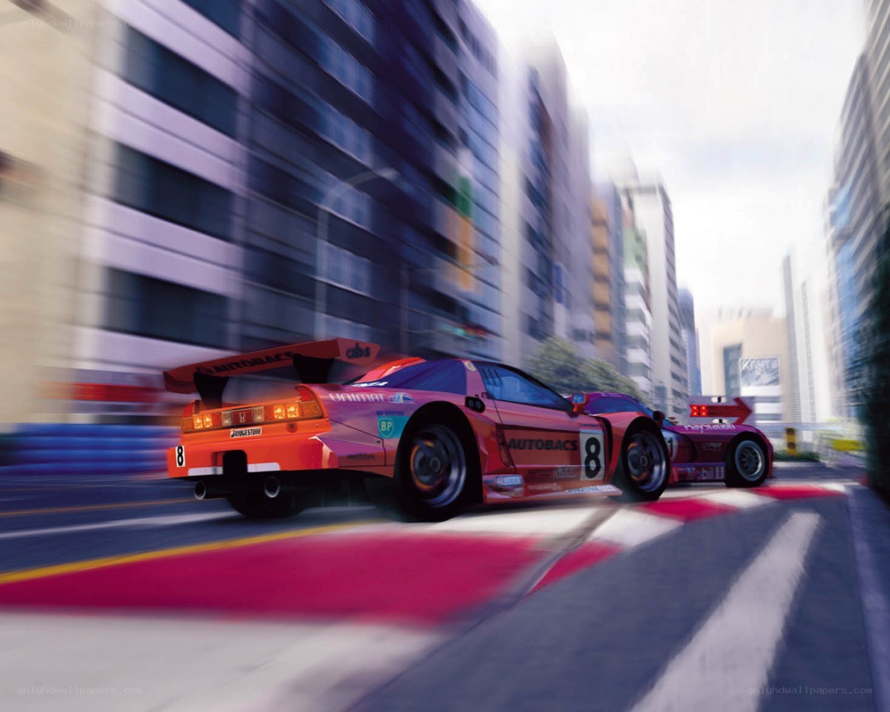 Race cars speeding through city