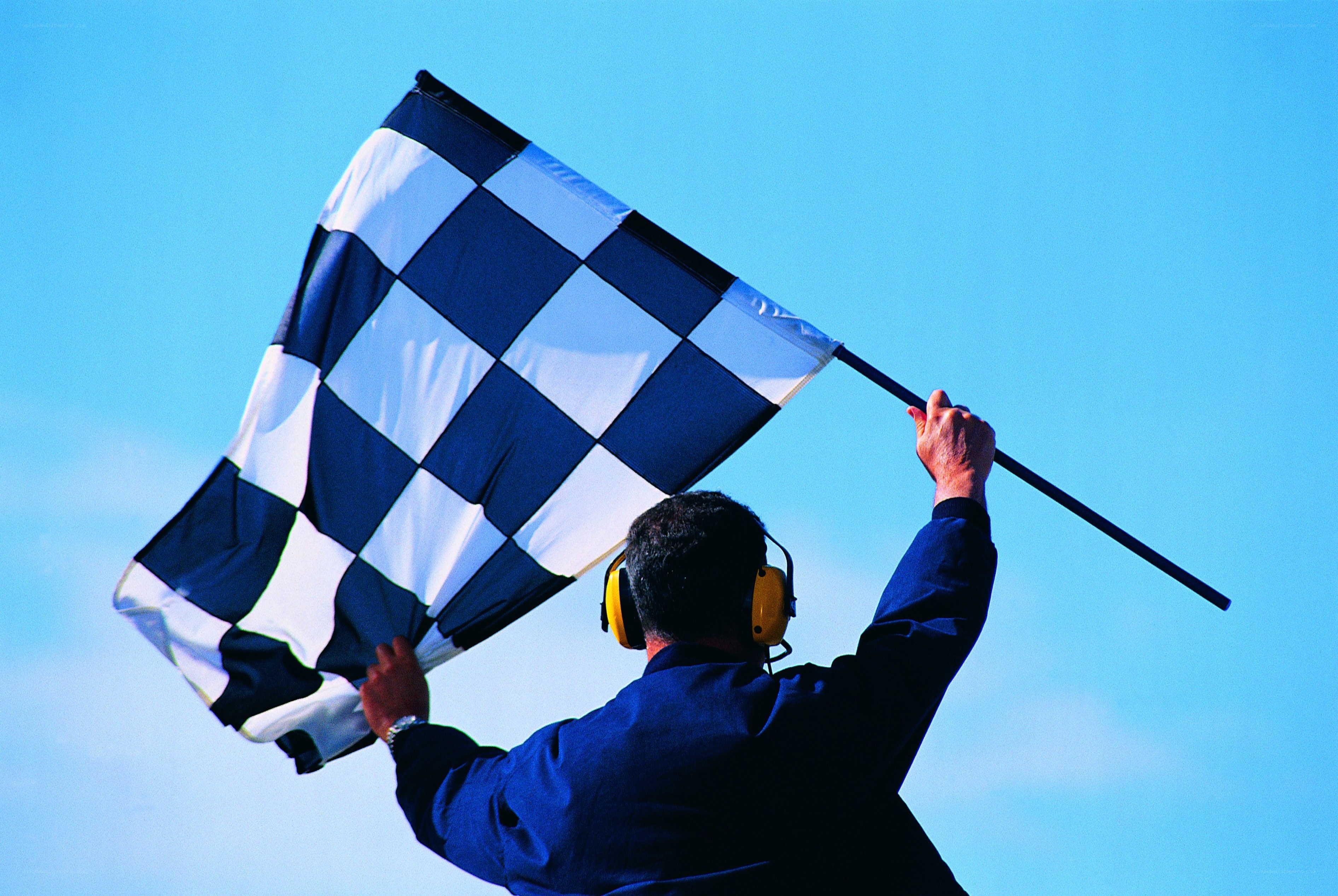 Race official with checkered flag