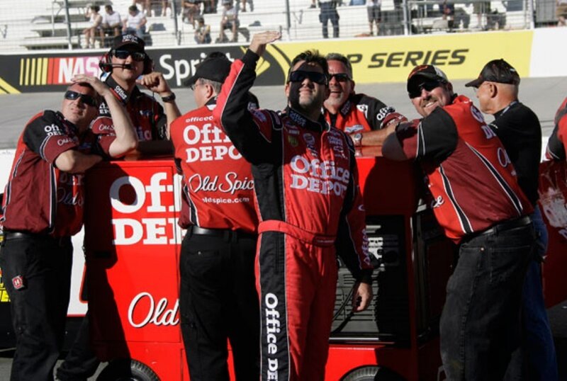 Race team celebrating on track
