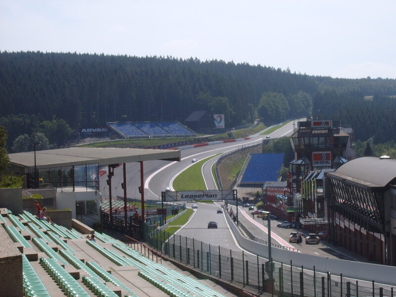 Race track with cars and stands