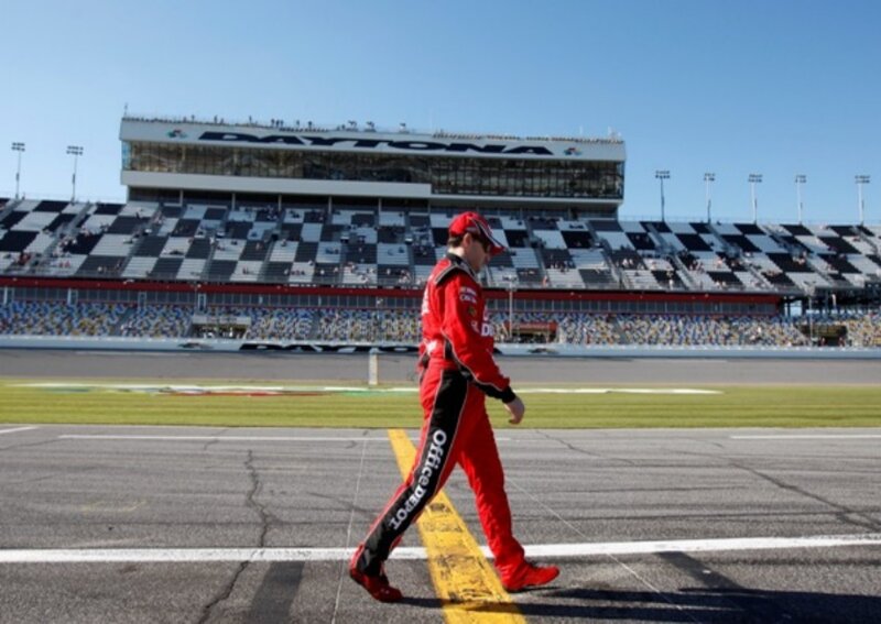 Racer walking on track