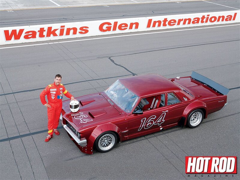 racer with red muscle car