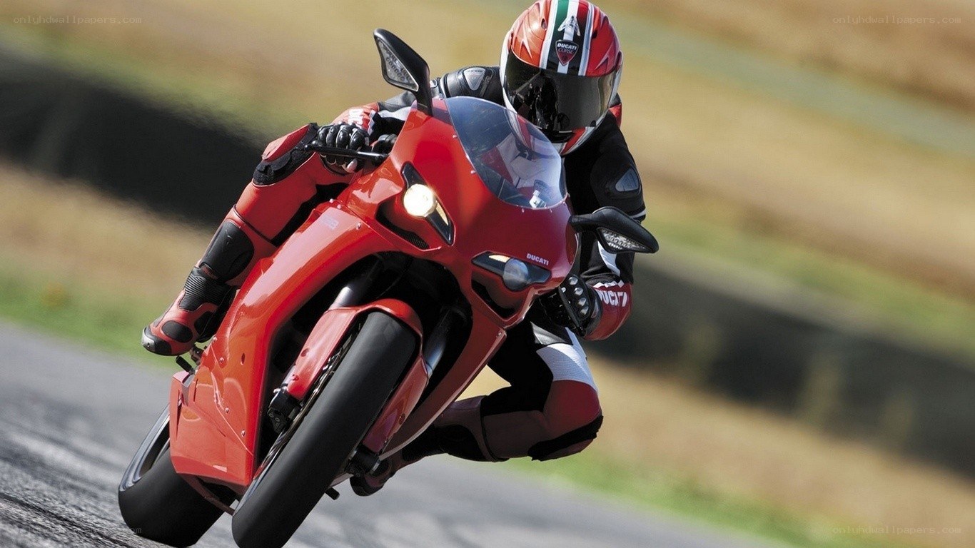 racing a red motorcycle