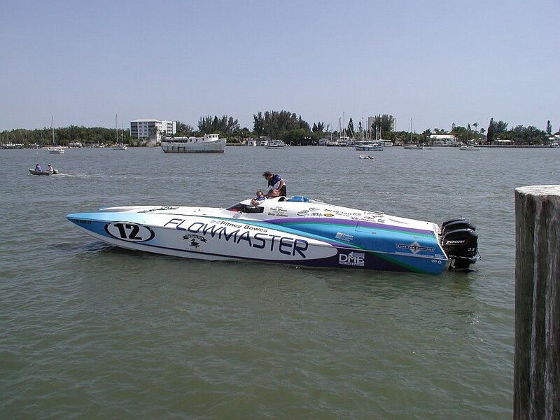 Racing Boat on Water — Blue, Calm