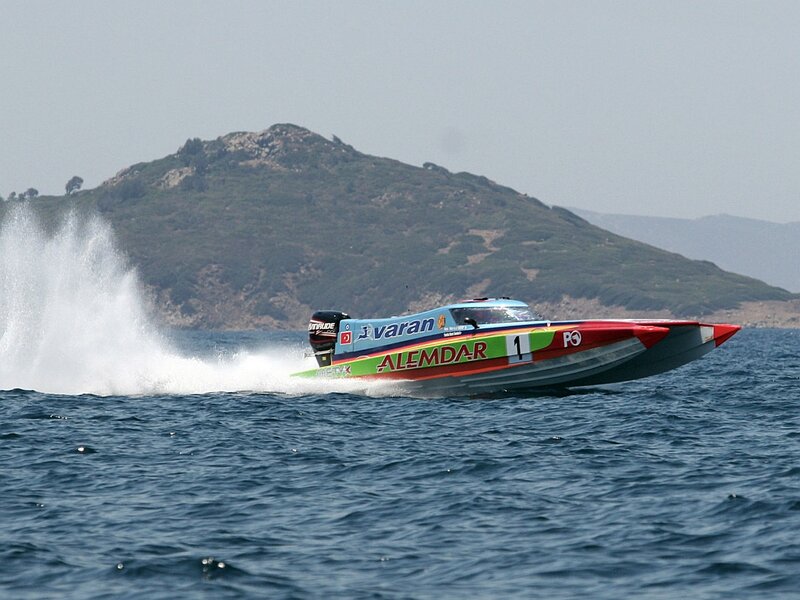 Racing Boat on Water — Blue, Dynamic, Afternoon, Photograph, Sea