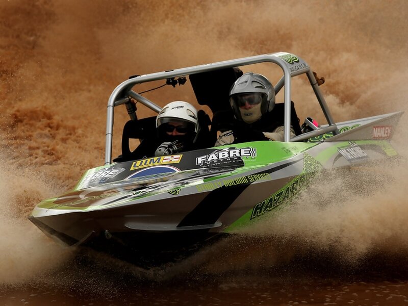 Racing Boat on Water — Green