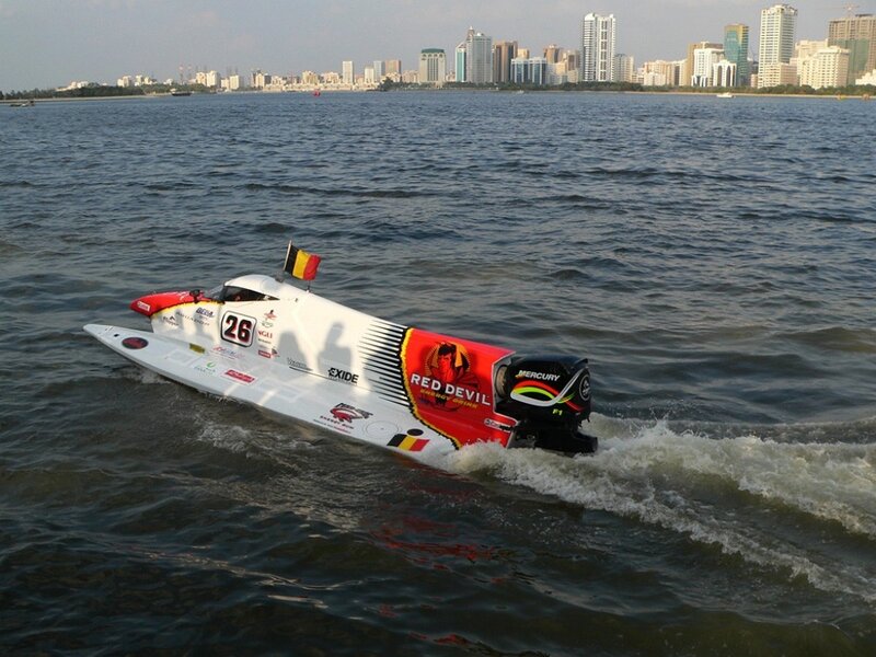Racing Boat on Water — White, Dynamic, Afternoon, Photograph, City Skyline