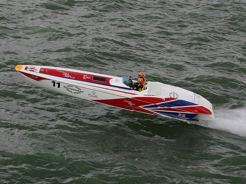 Racing Boat on Water — White, Dynamic, Photograph