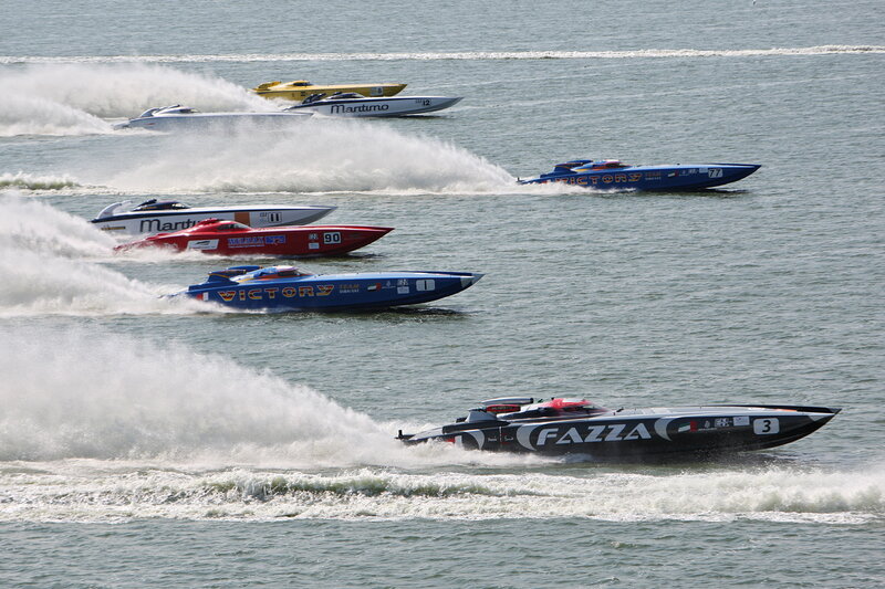 Racing Boats on Water — Blue, Dynamic