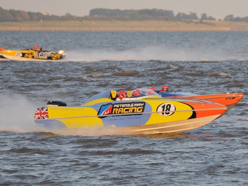 Racing Boats on Water — Yellow