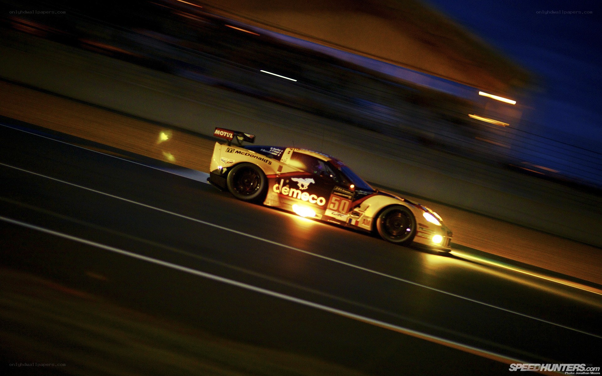 racing car at night on track