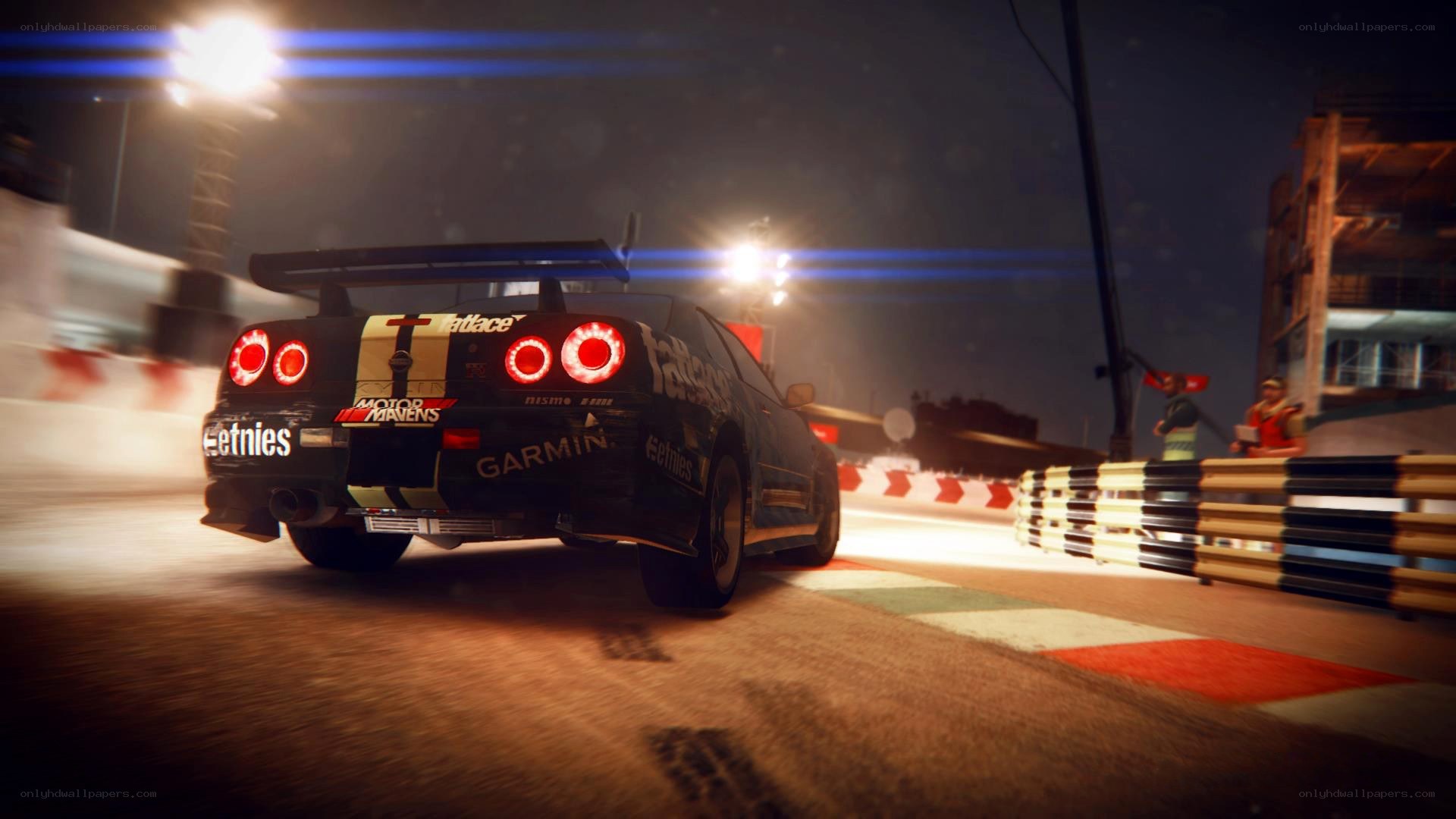 racing car at night on track