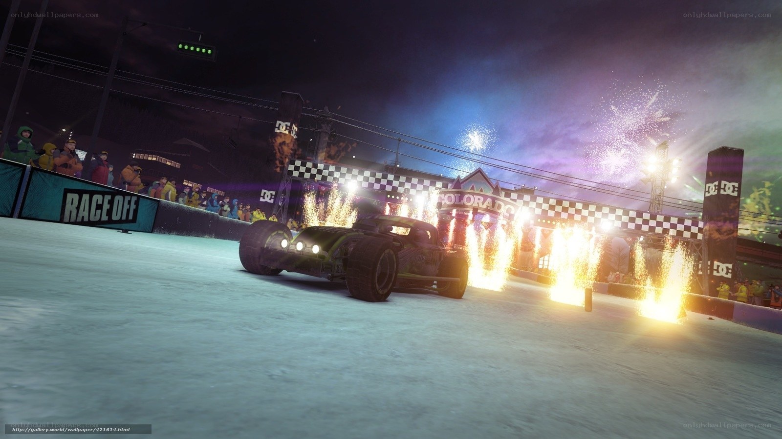 racing car at night with fireworks