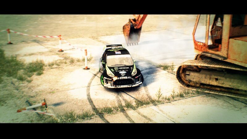 racing car drifting near excavator