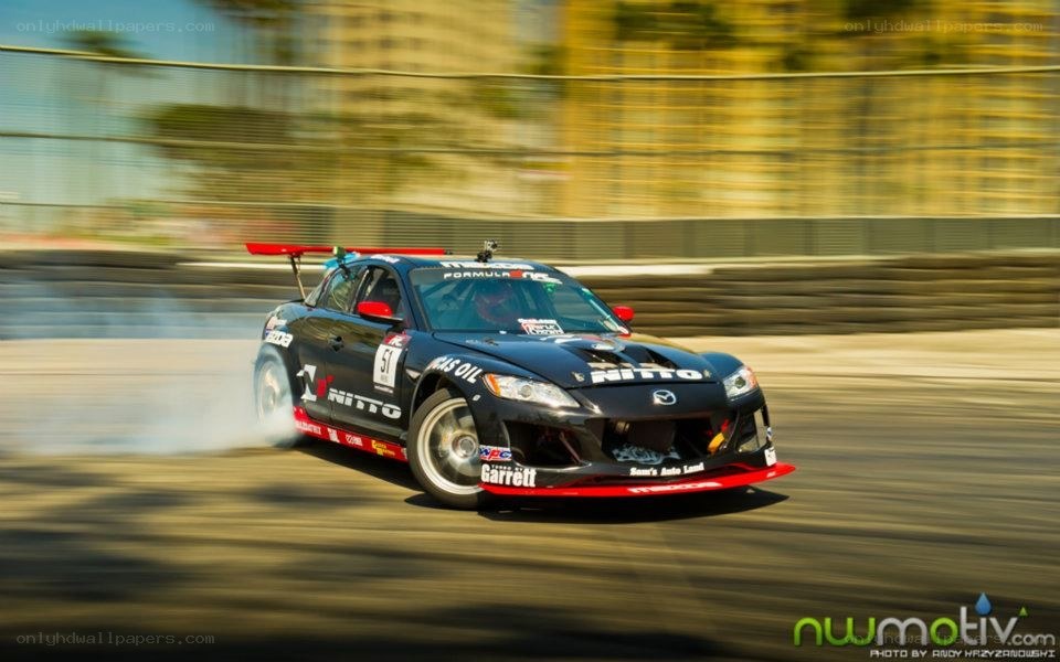 racing car drifting on track