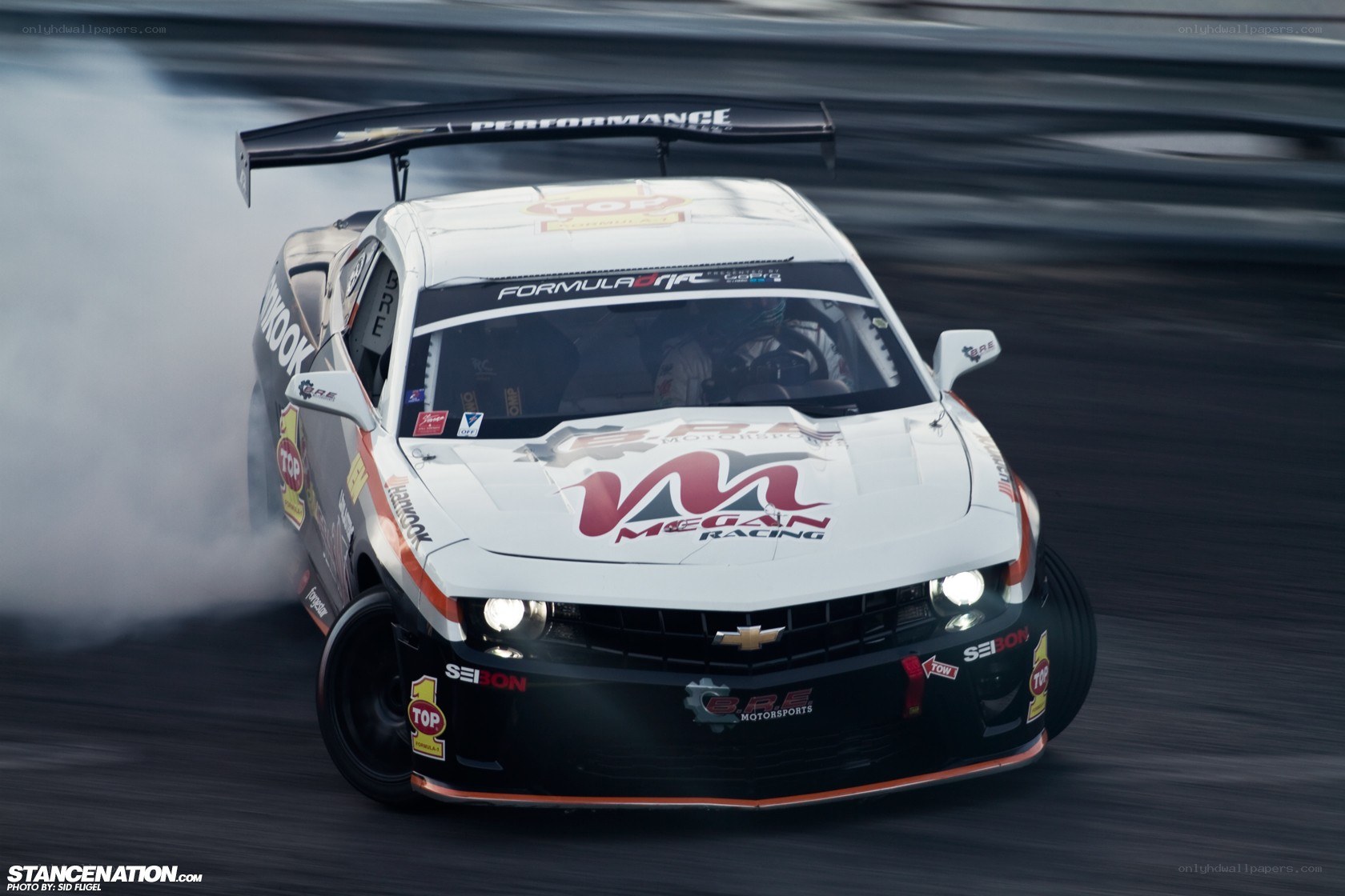 racing car drifting on track