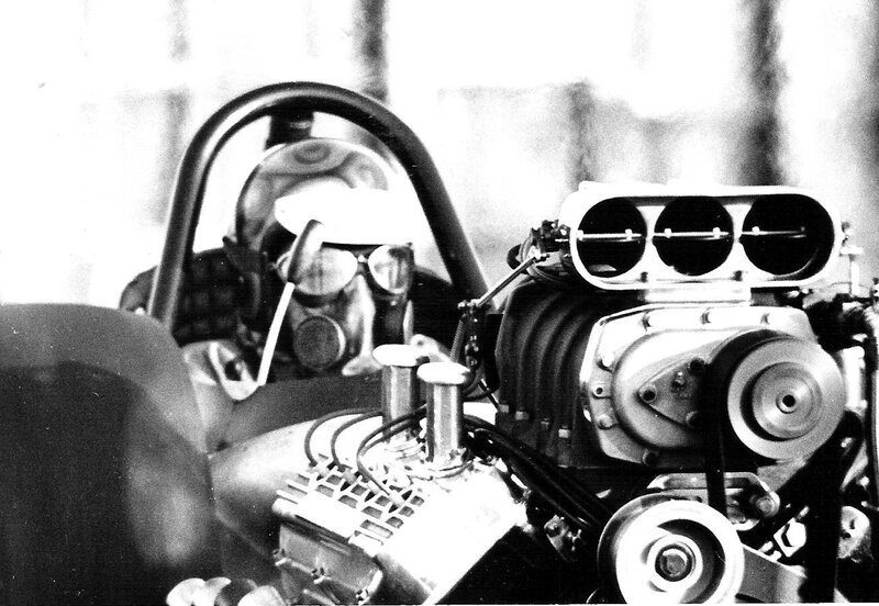racing car engine and driver