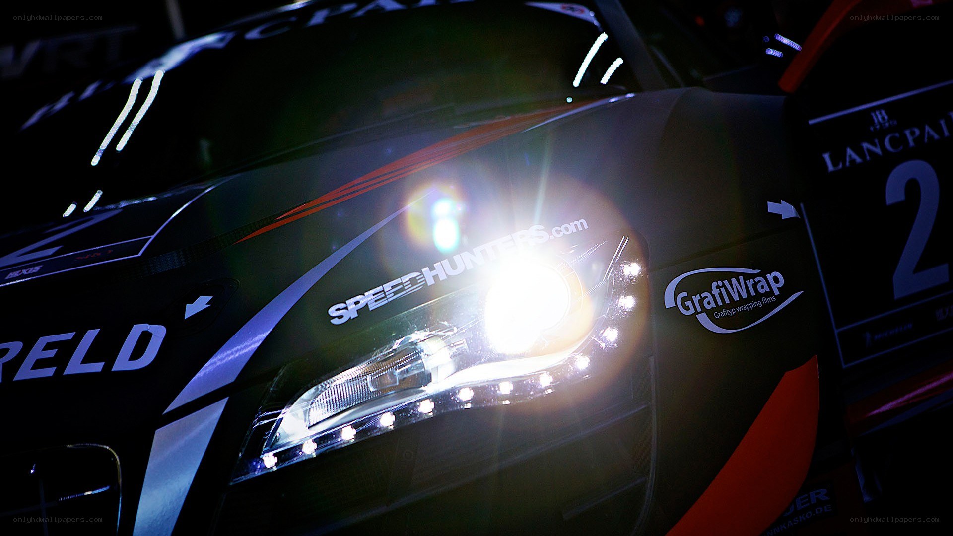 racing car headlight at night