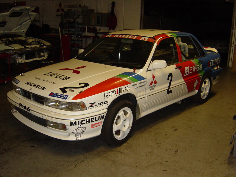 Racing Car in Garage — White