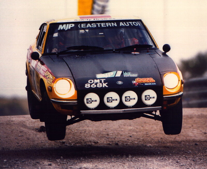 racing car in mid-air jump