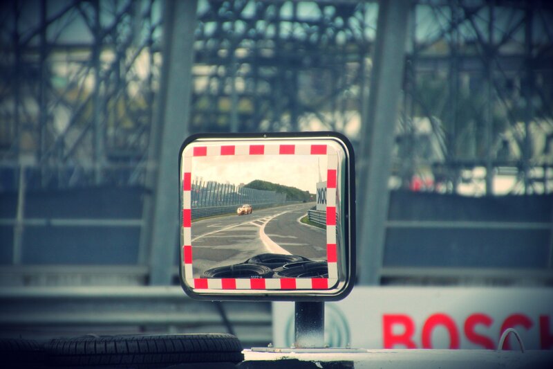 Racing car in mirror reflection