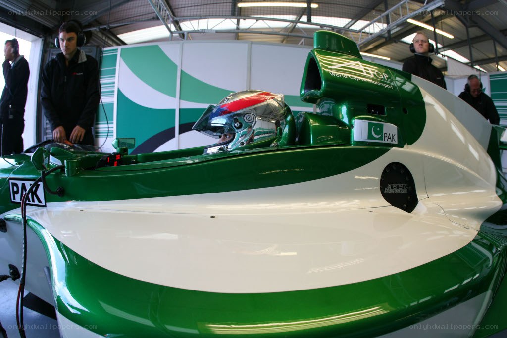 racing car in pit garage