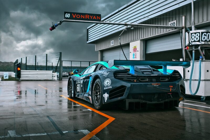 Racing Car in Pit Lane — Black, Dramatic, Afternoon
