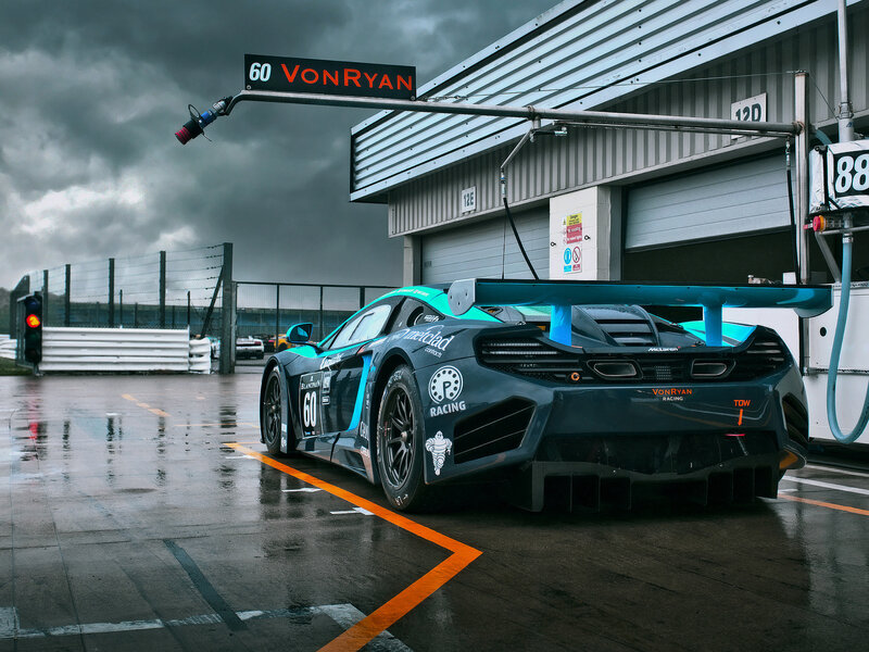 Racing Car in Pit Lane — Black