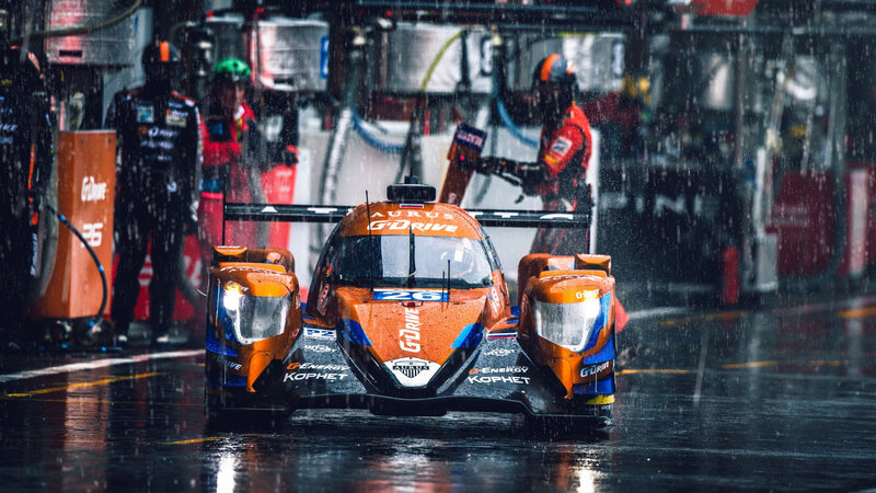 Racing Car in Pit Lane — Orange