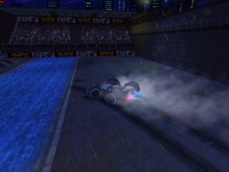 racing car in rain at night